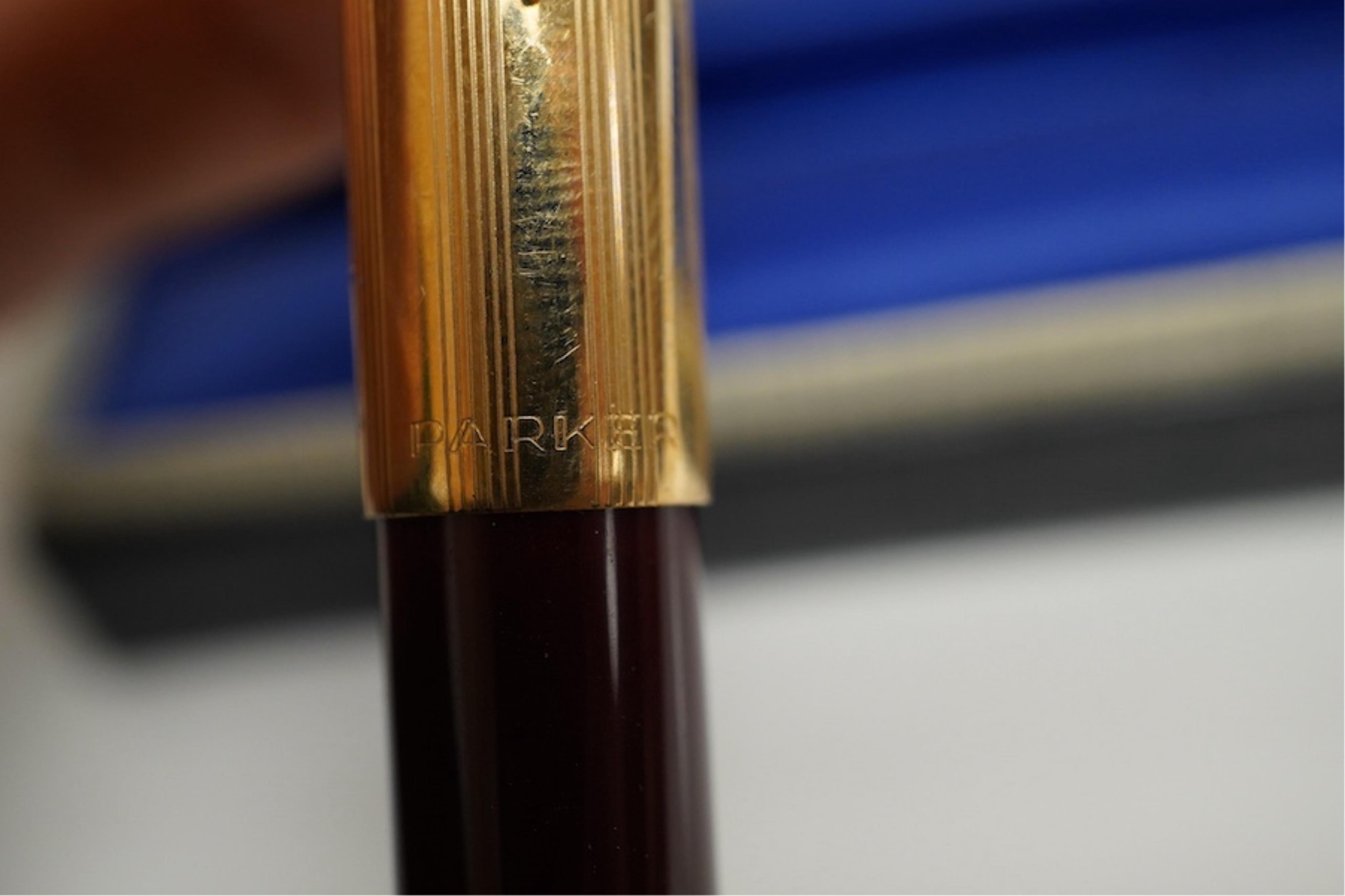 A cased Parker fountain pen. Condition - fair